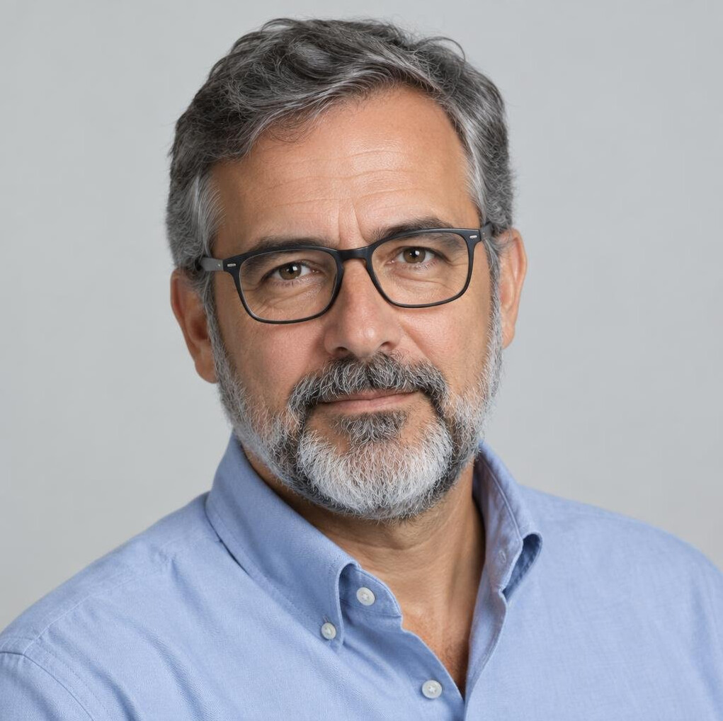 Studio portrait of a Portuguese senior investigative reporter