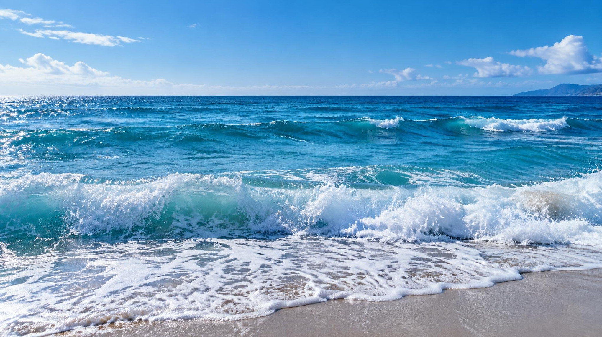 ocean waves with blue water